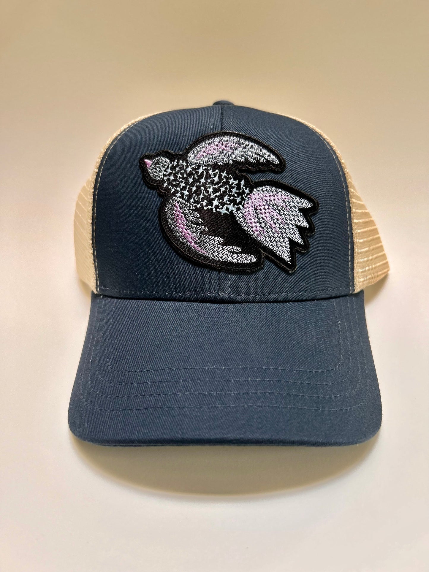 Purple Bird trucker hat one size fits most